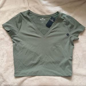 green baby tee